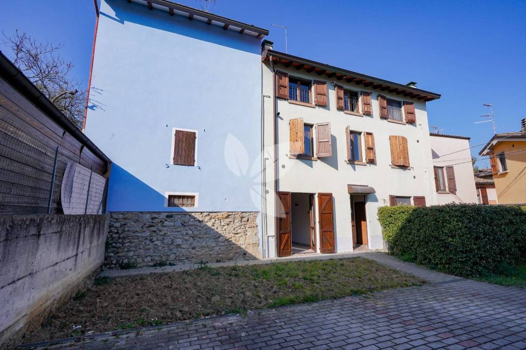 Bilocale con giardino privato e posto auto