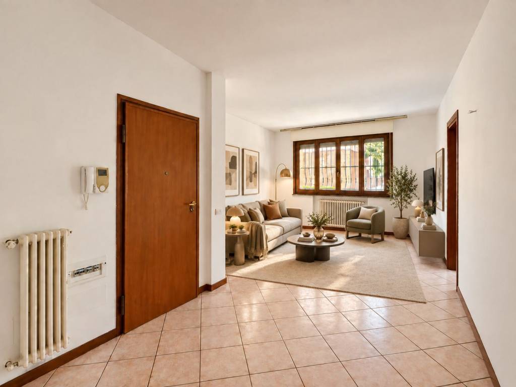 Spazioso trilocale con giardino privato e garage doppio.